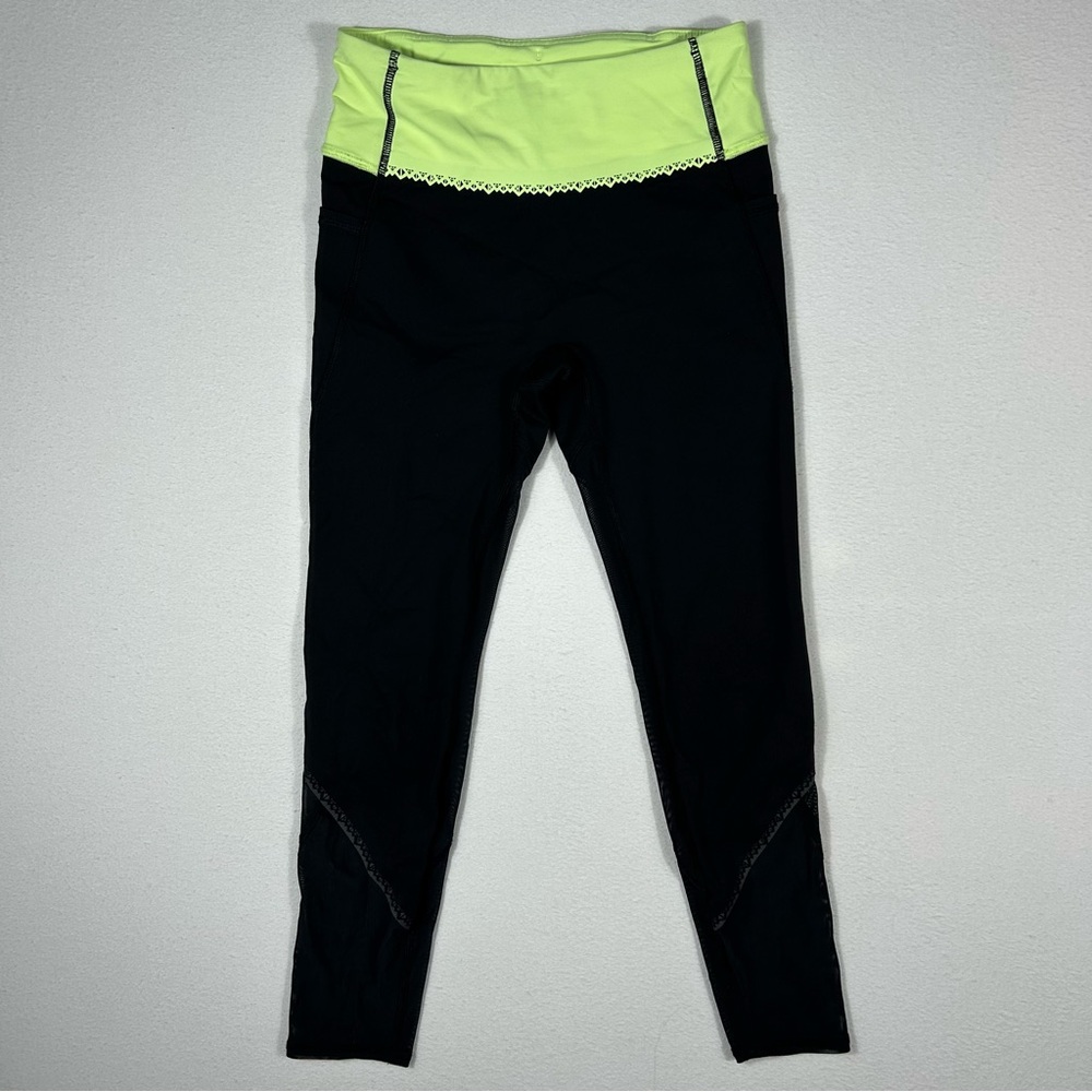 Ivivva Black Leggings with Neon Yellow Waistband scalloped and mesh details